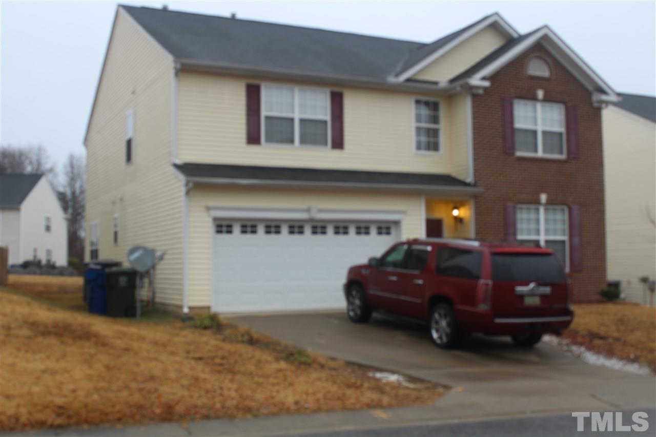 3339 Dutchman Road Raleigh, NC 27610 - Photo 4 of 4 a front view of a house with parking space