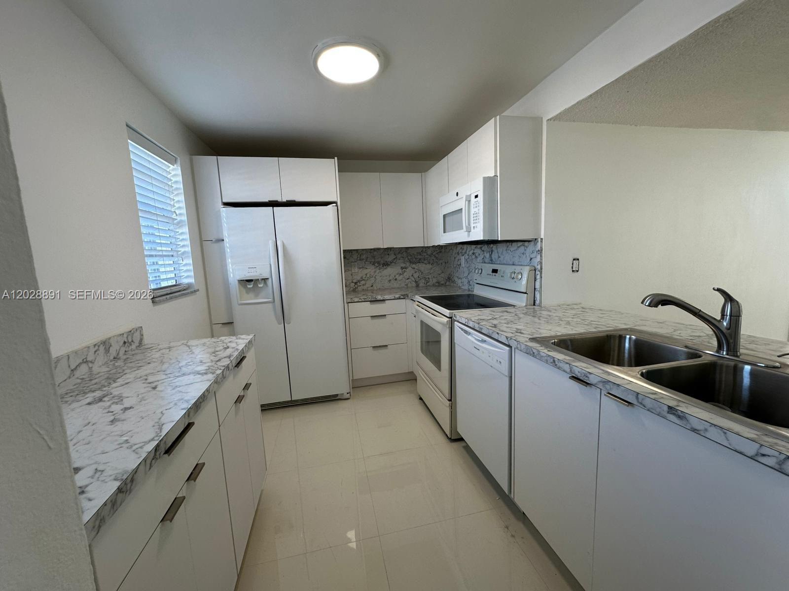 14170 Southwest 84th Street, Unit 402F Miami, FL 33183 - Photo 13 of 36 Kitchen - Another view