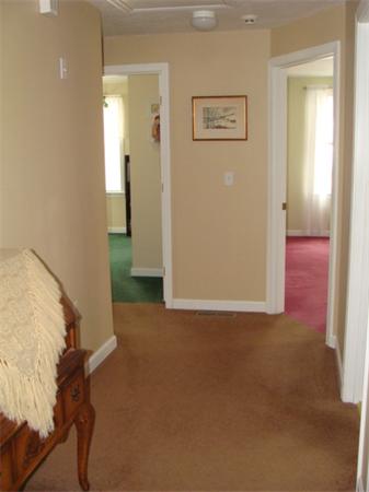 4 Kerri Lane Whitman, MA 02382 - Photo 18 of 30 a view of a room with wooden floor and bathroom