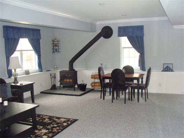 4 Kerri Lane Whitman, MA 02382 - Photo 26 of 30 a view of a livingroom with furniture and a window