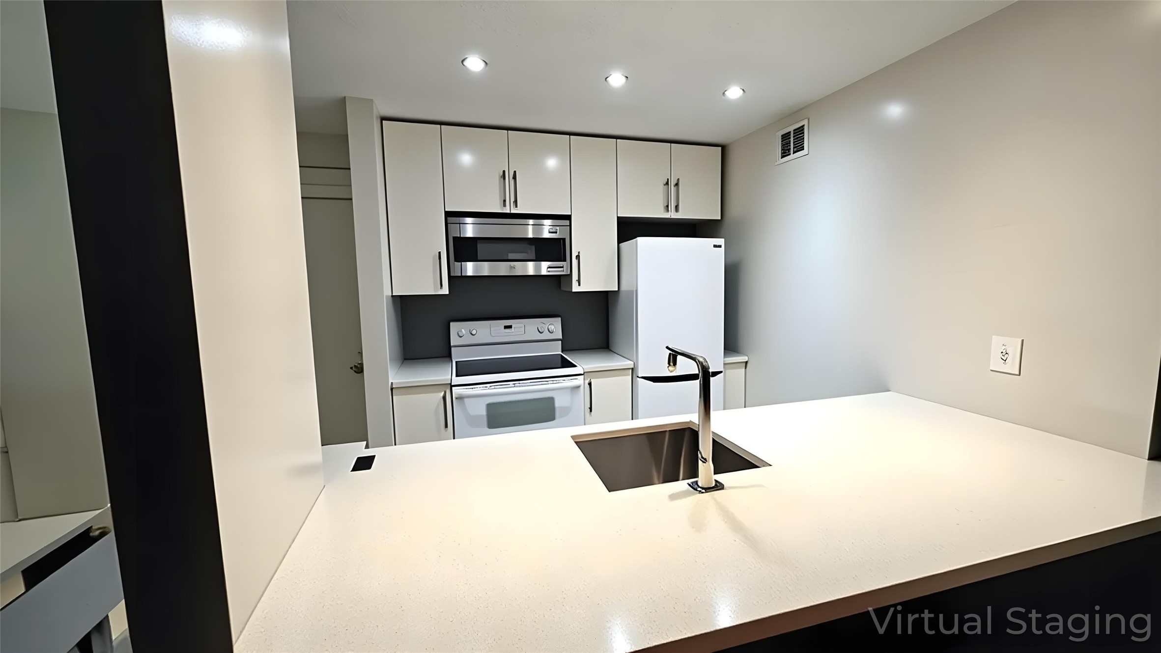 6601 Sands Point Drive, Unit 34 Houston, TX 77074 - Photo 6 of 24 a kitchen with stainless steel appliances a refrigerator and a stove top oven