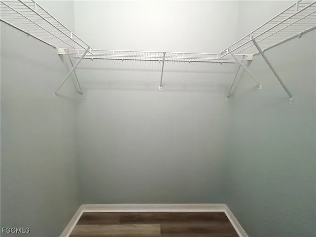 a view of small space with racks on the wall