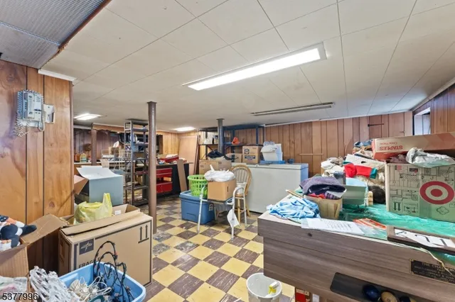 a room with furniture and a wooden floor