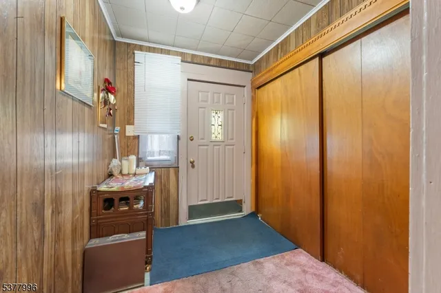 a view of a kitchen from the hallway