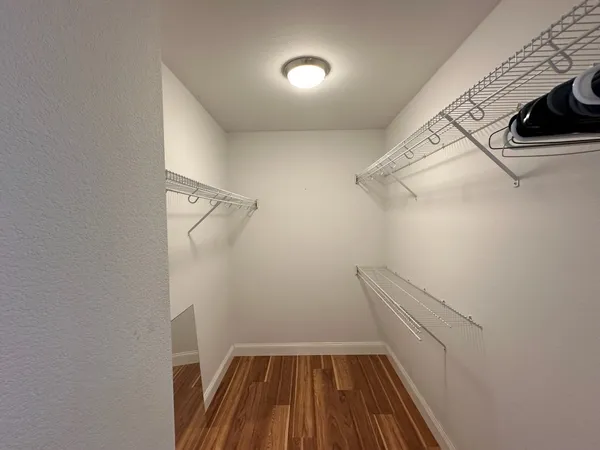 a view of a room with racks on the wall