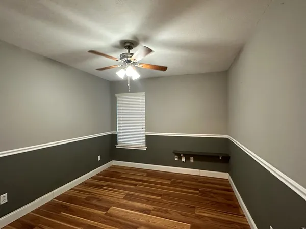 a view of a room with a window