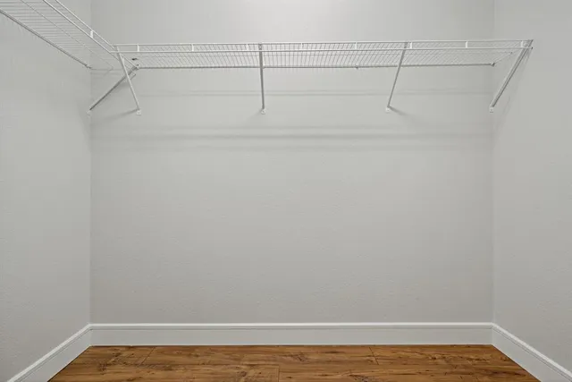 a view of a room with racks on the wall