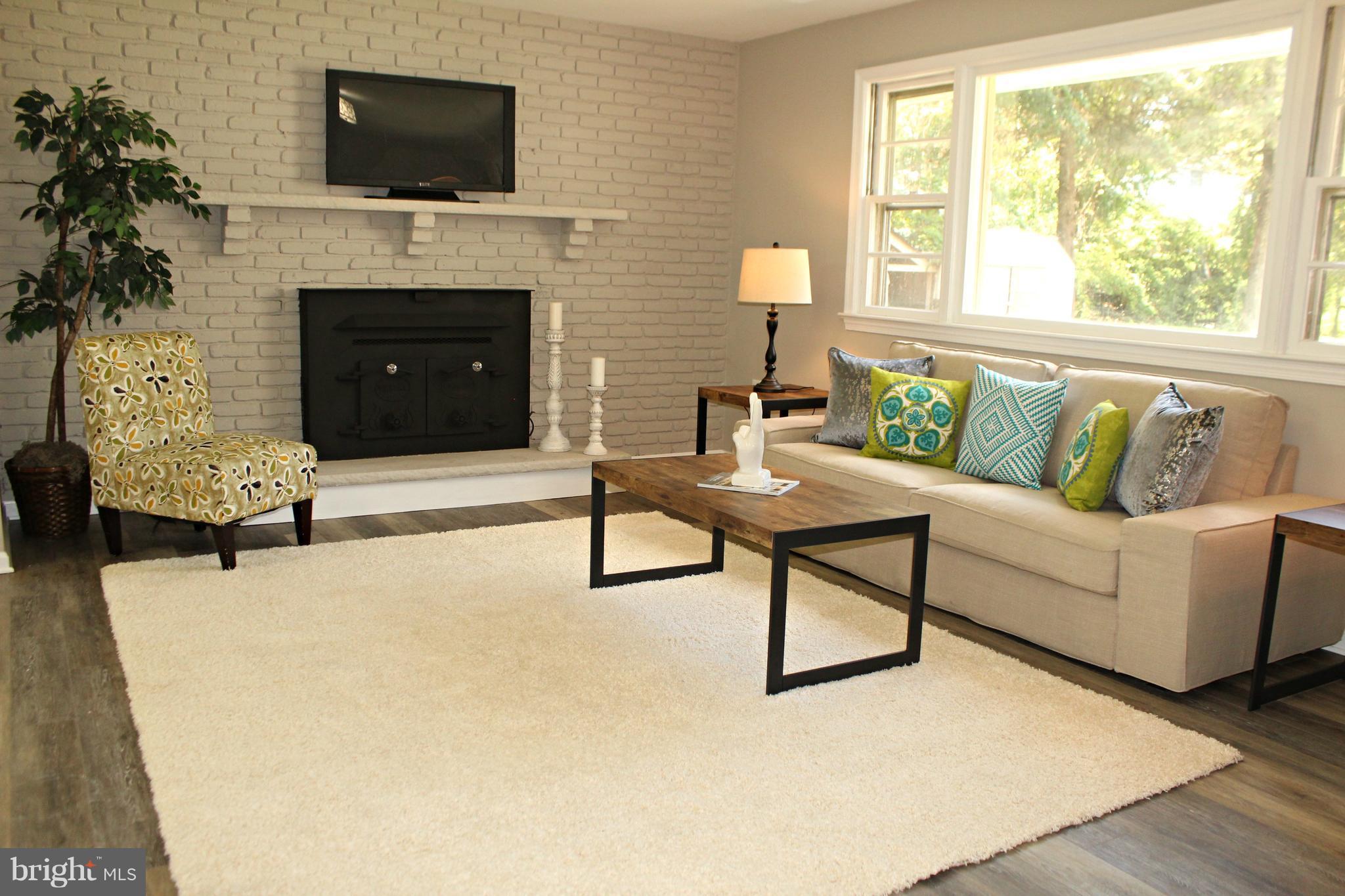6104 Sam Riggs Road Laytonsville, MD 20882 - Photo 8 of 29 Fireplace in living room!