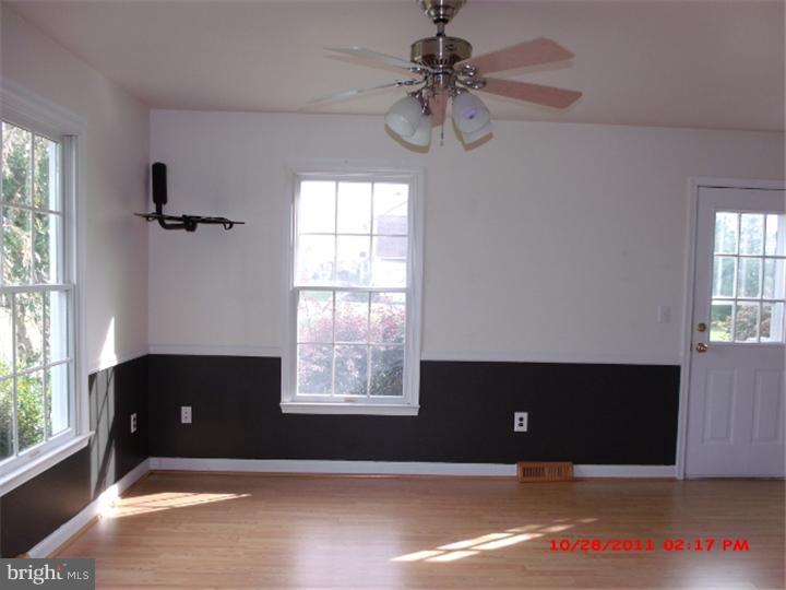 793 East Pebworth Road Magnolia, DE 19962 - Photo 6 of 12 an empty room with windows