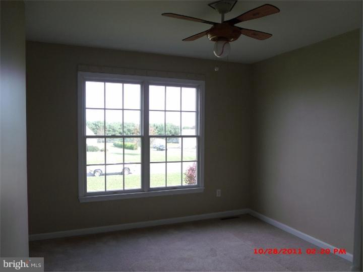 793 East Pebworth Road Magnolia, DE 19962 - Photo 9 of 12 a view of room window and a ceiling fan