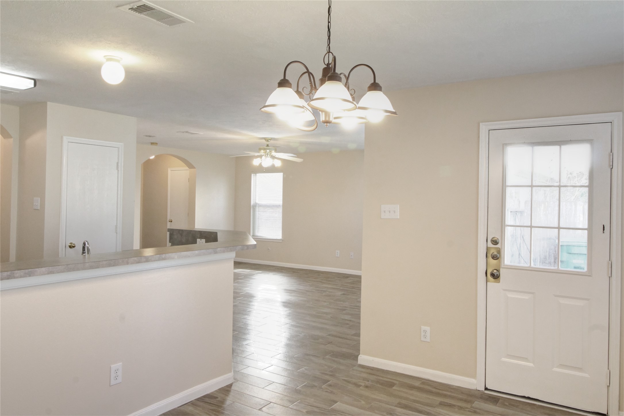 5530 Violet Path Lane Houston, TX 77085 - Photo 6 of 17 a very nice looking room with wooden floor