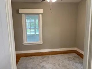 a view of a room that has a window in it