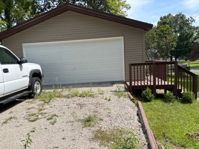 a view of a backyard with a garden