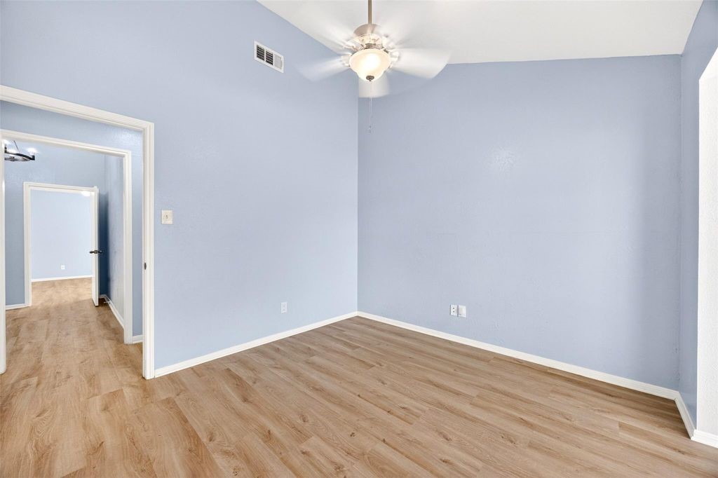 17 April Point Drive North Conroe, TX 77356 - Photo 18 of 42 wooden floor in an empty room