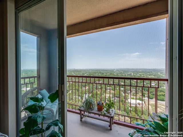 a balcony with furniture