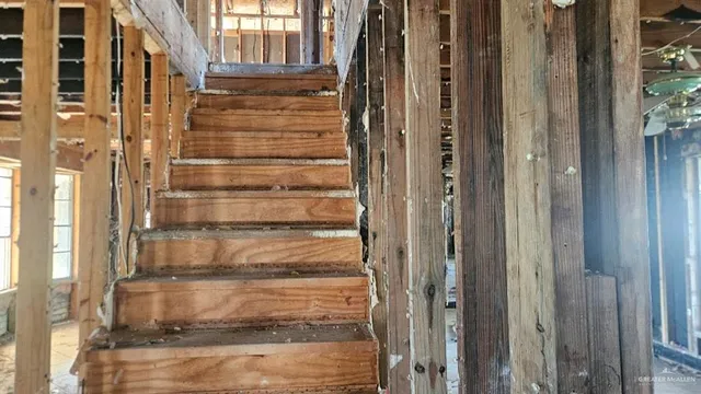 a view of entryway with brick walls