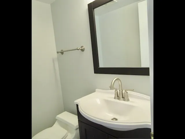 a bathroom with a sink and a toilet