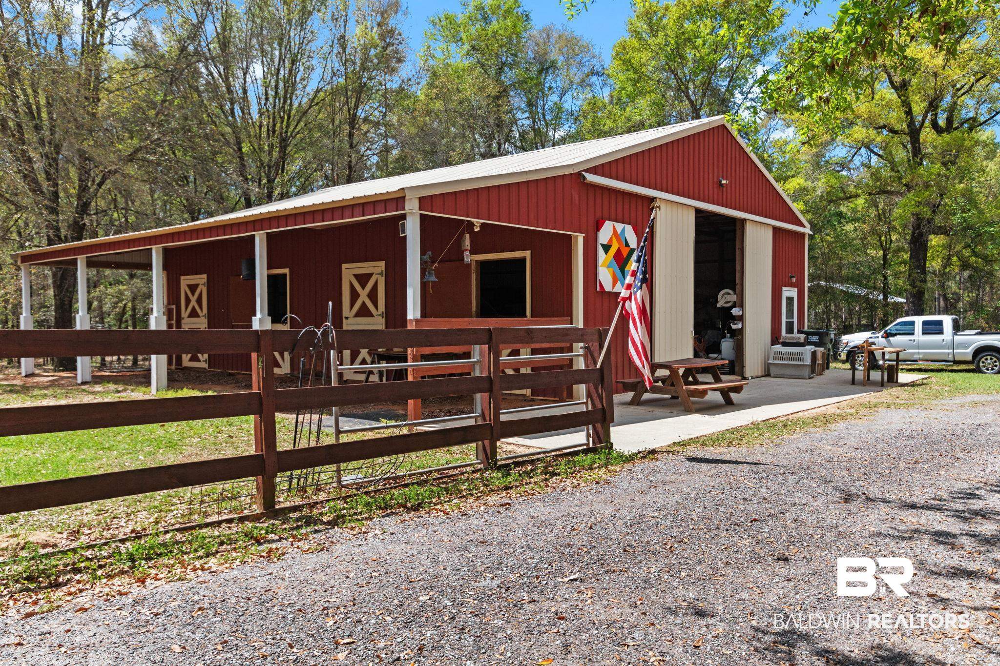 24250 Hack Road Bay Minette, AL 36507 - Photo 66 of 88 Side view of barn with 4 horse stalls