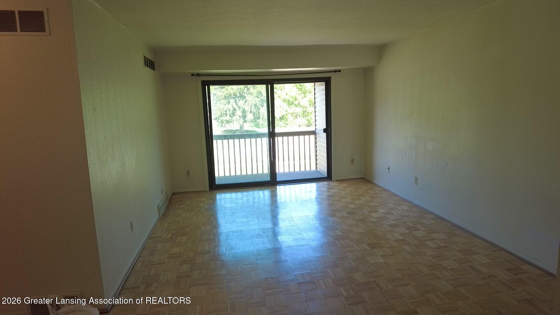 5400 Maple Road, Unit 29 Haslett, MI 48840 - Photo 4 of 11 living room 1