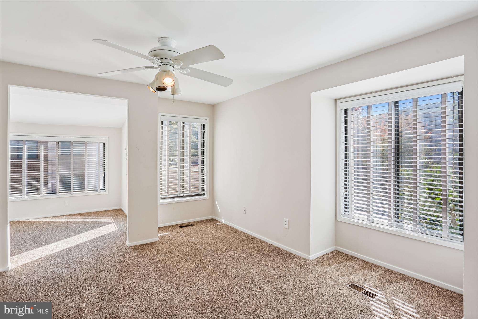 18801 Nathans Place Gaithersburg, MD 20886 - Photo 14 of 60 a view of an empty room with a window