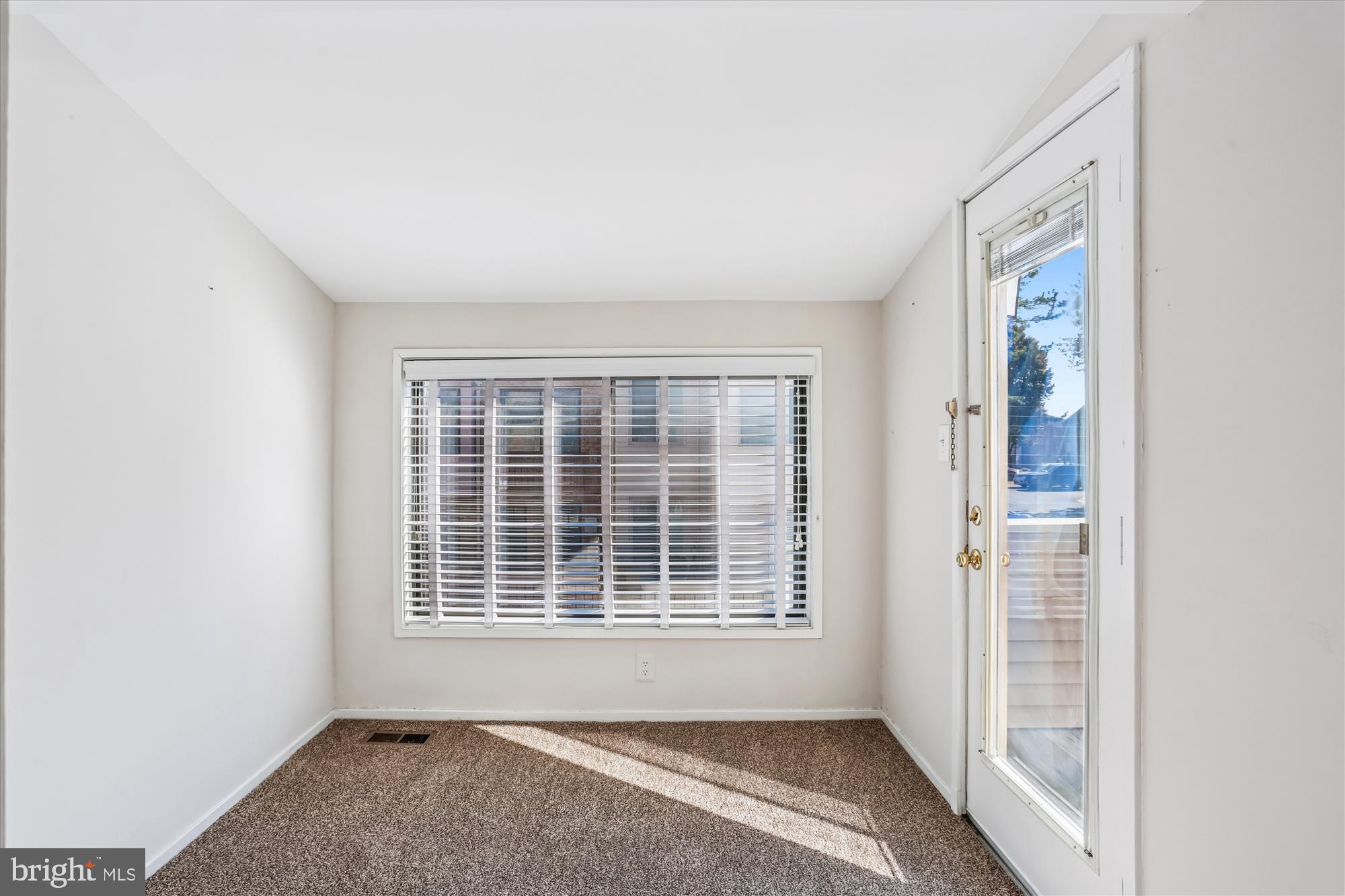18801 Nathans Place Gaithersburg, MD 20886 - Photo 15 of 60 a view of an empty room with a window