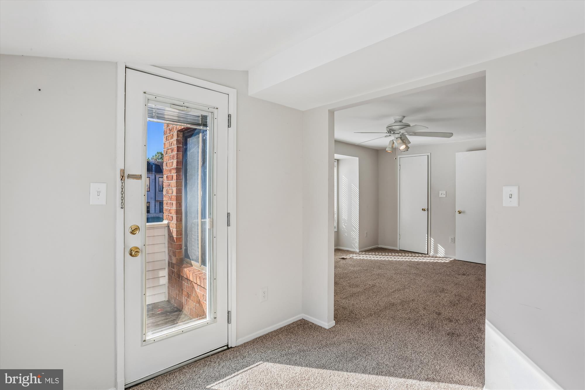 18801 Nathans Place Gaithersburg, MD 20886 - Photo 16 of 60 a view of a hallway with wooden shelves