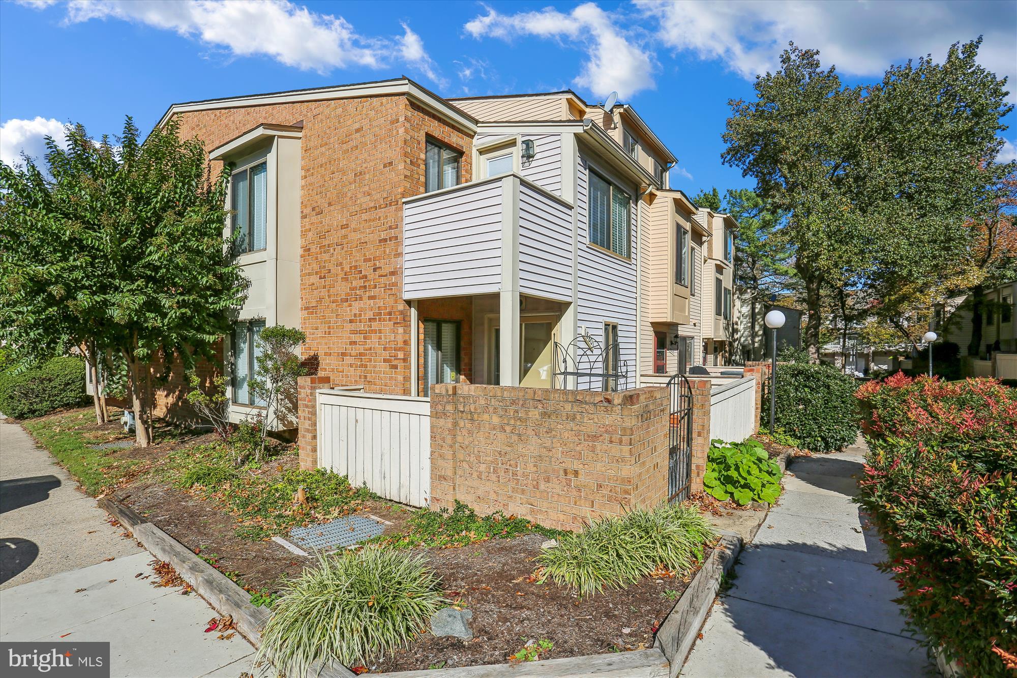 18801 Nathans Place Gaithersburg, MD 20886 - Photo 2 of 60 front view of a house with a yard