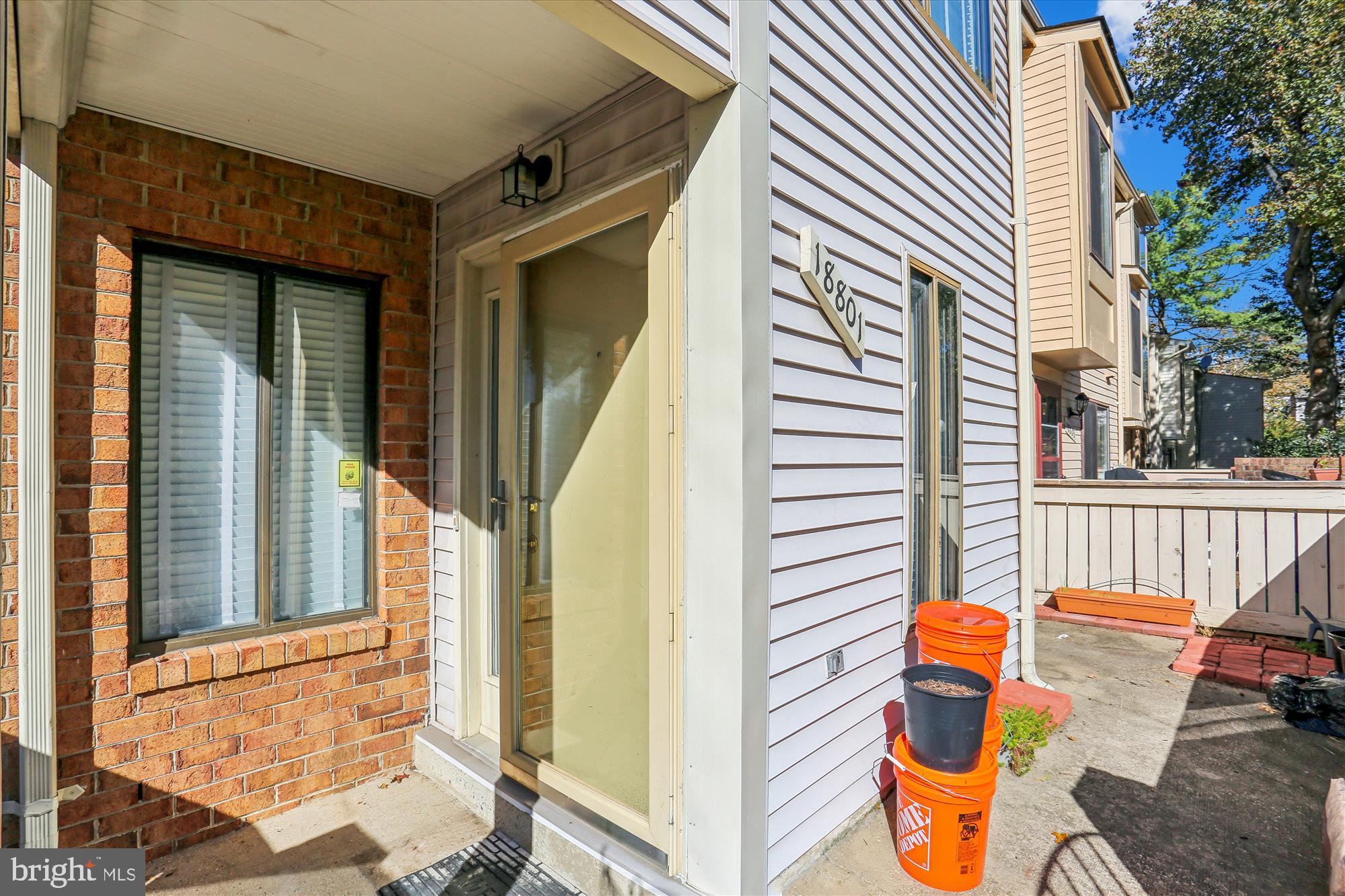 18801 Nathans Place Gaithersburg, MD 20886 - Photo 3 of 60 a view of a chair and table in the balcony