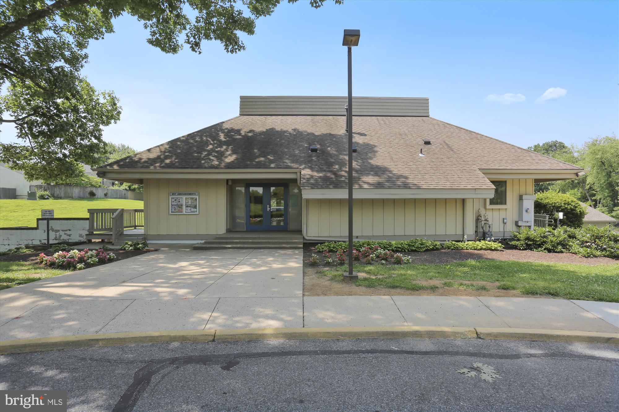 18801 Nathans Place Gaithersburg, MD 20886 - Photo 33 of 60 a front view of a house with garden