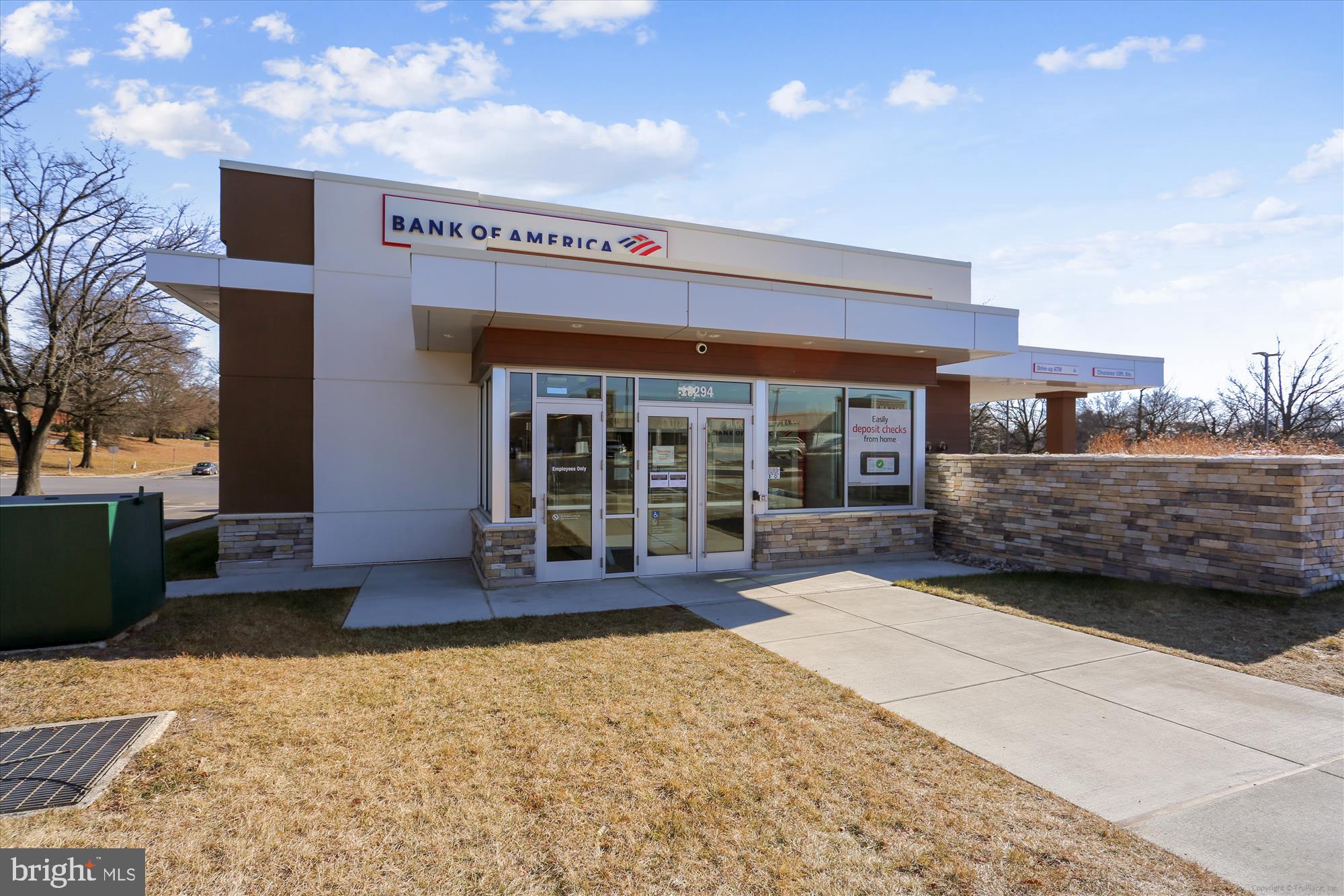 18801 Nathans Place Gaithersburg, MD 20886 - Photo 43 of 60 a front view of a house with a large window and potted plants
