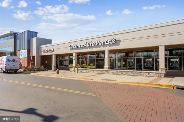 a car parked in front of a building