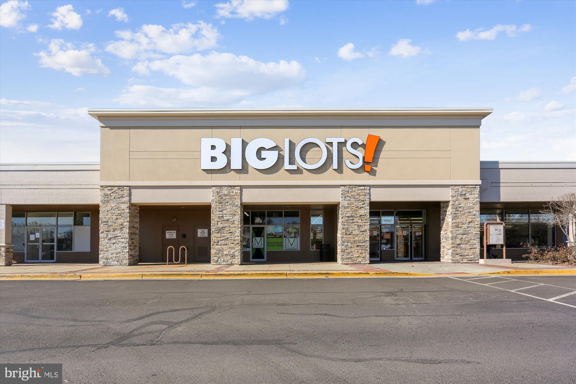 18801 Nathans Place Gaithersburg, MD 20886 - Photo 48 of 60 a view of a brick building with a large window
