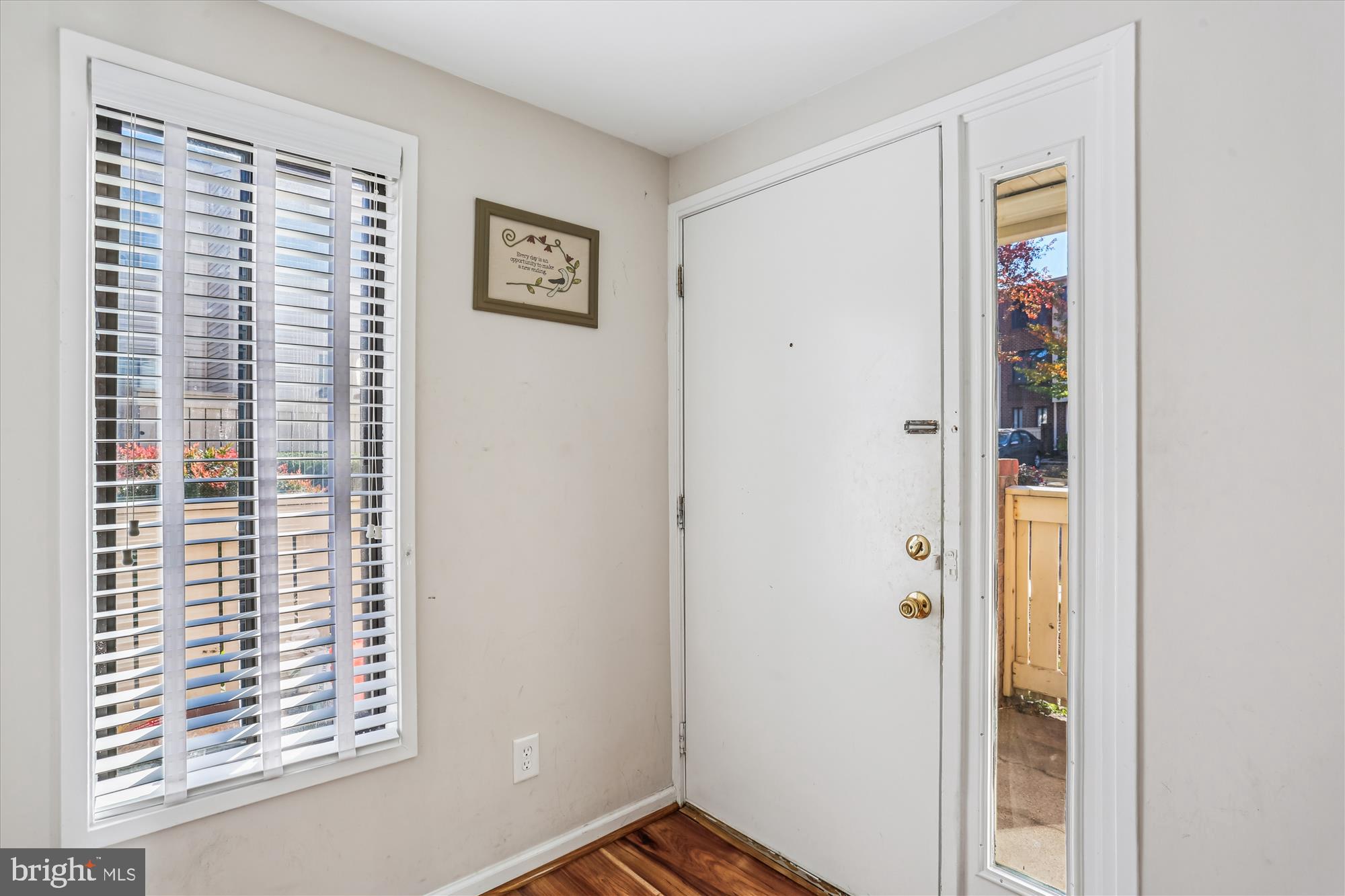 18801 Nathans Place Gaithersburg, MD 20886 - Photo 6 of 60 a view of an entryway with wooden floor
