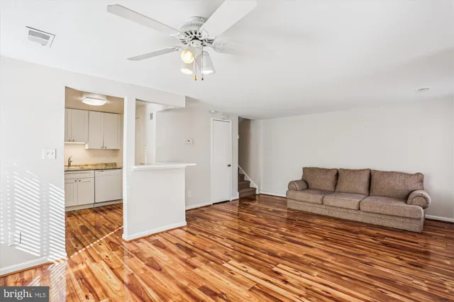 a kitchen with appliances and cabinets