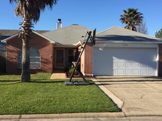 1784 Old Ranch Road Fort Walton Beach, FL 32547 - Photo 1 of 16 a front view of a house with a yard