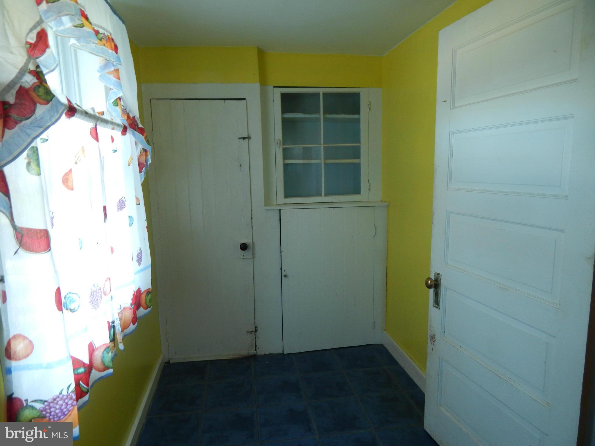 2443 Rocks Road Forest Hill, MD 21050 - Photo 13 of 21 a view of storage and utility room with a window