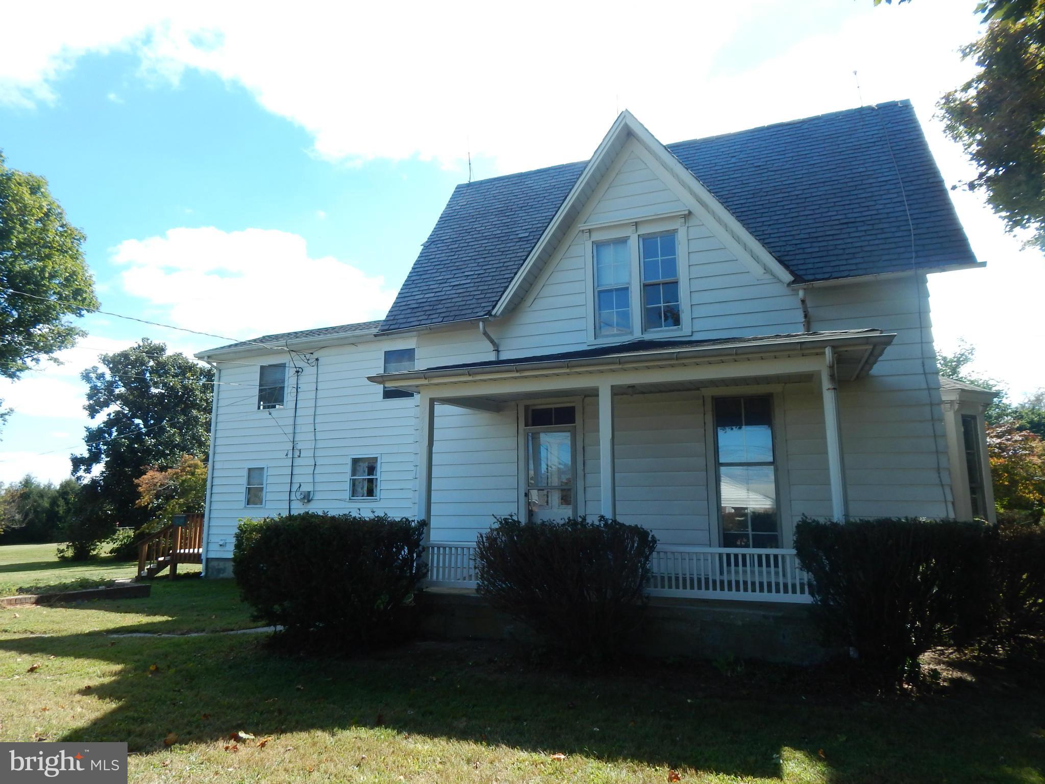 2443 Rocks Road Forest Hill, MD 21050 - Photo 19 of 21 a front view of a house with garden
