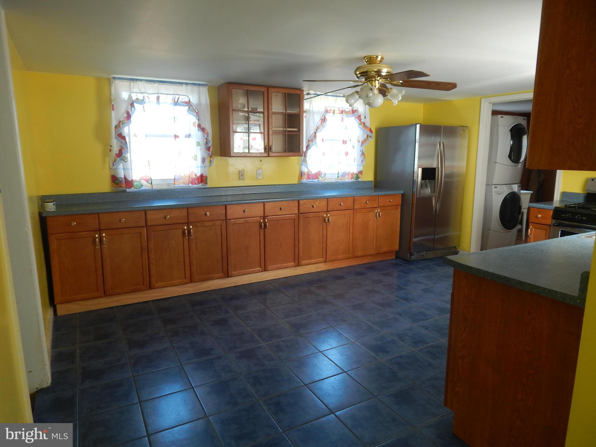2443 Rocks Road Forest Hill, MD 21050 - Photo 7 of 21 a kitchen with cabinets and window