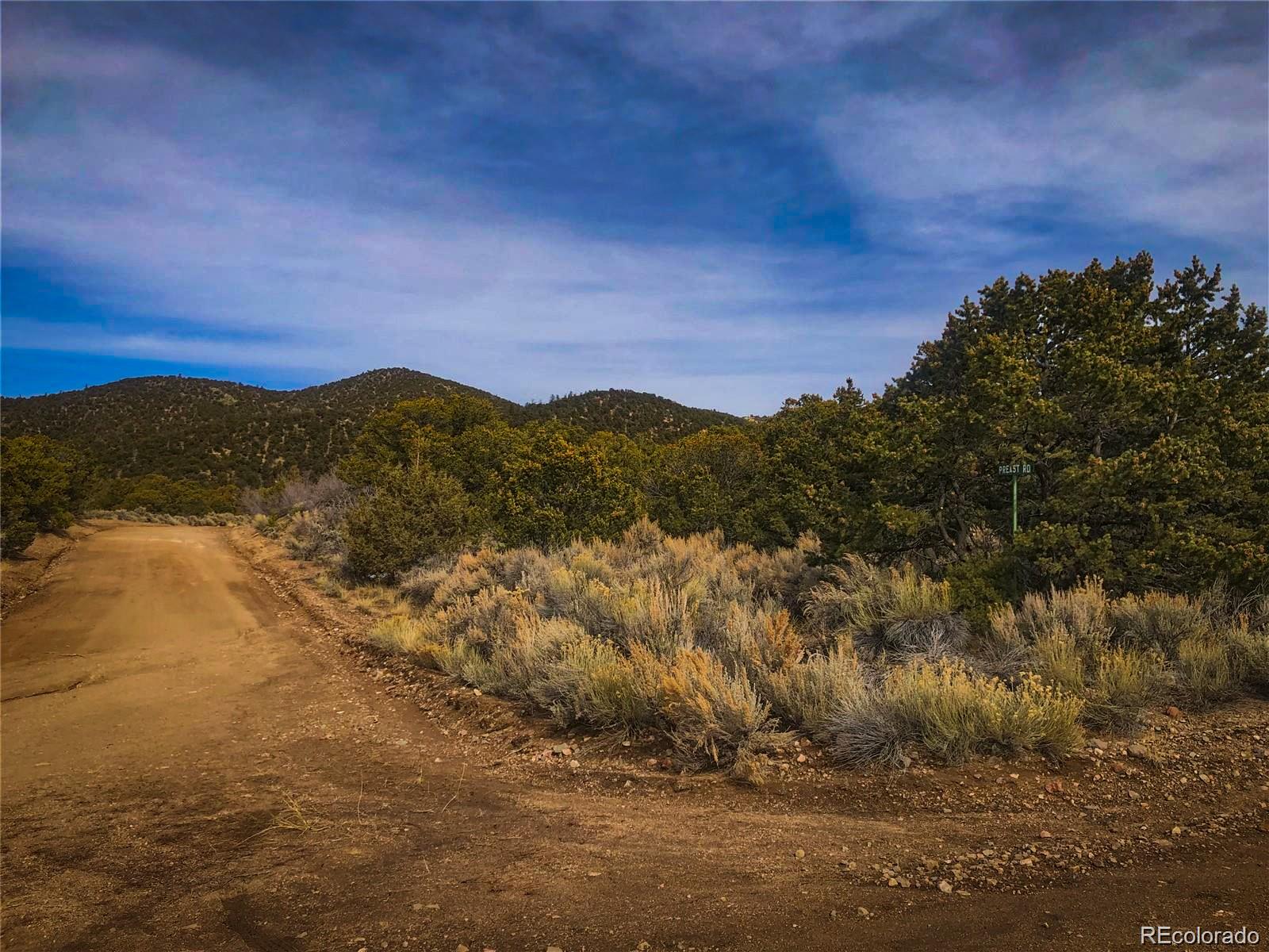 0 Preast Road San Luis, CO 81152 - Photo 1 of 6 a view of mountain with sunset in background