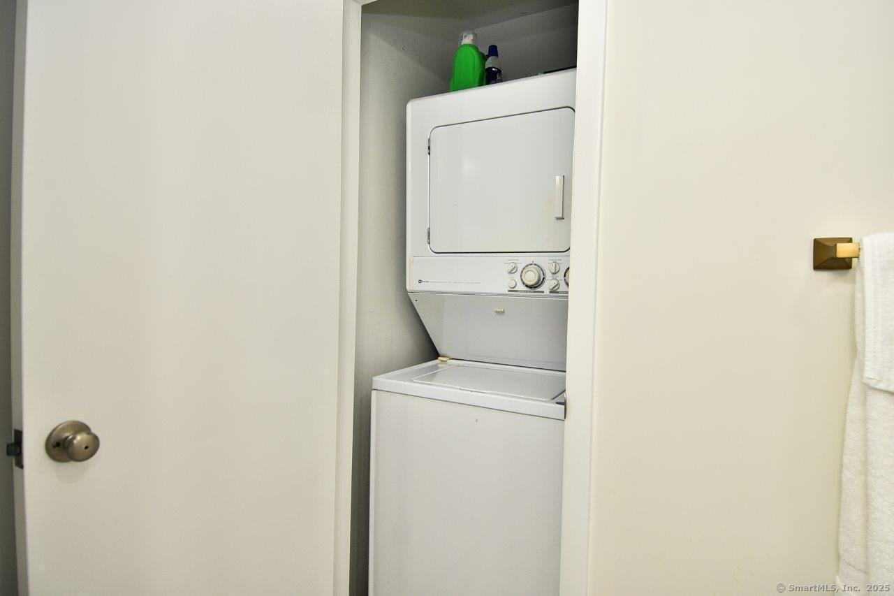 178 Flax Hill Road, Unit C203 Norwalk, CT 06854 - Photo 25 of 35 a utility room with dryer and washer
