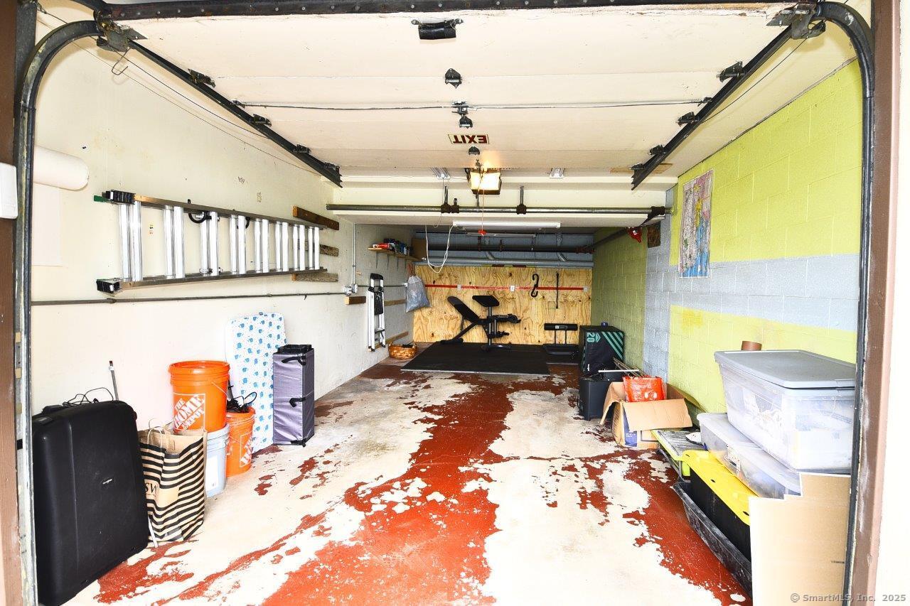 178 Flax Hill Road, Unit C203 Norwalk, CT 06854 - Photo 28 of 35 a bedroom with furniture and a window