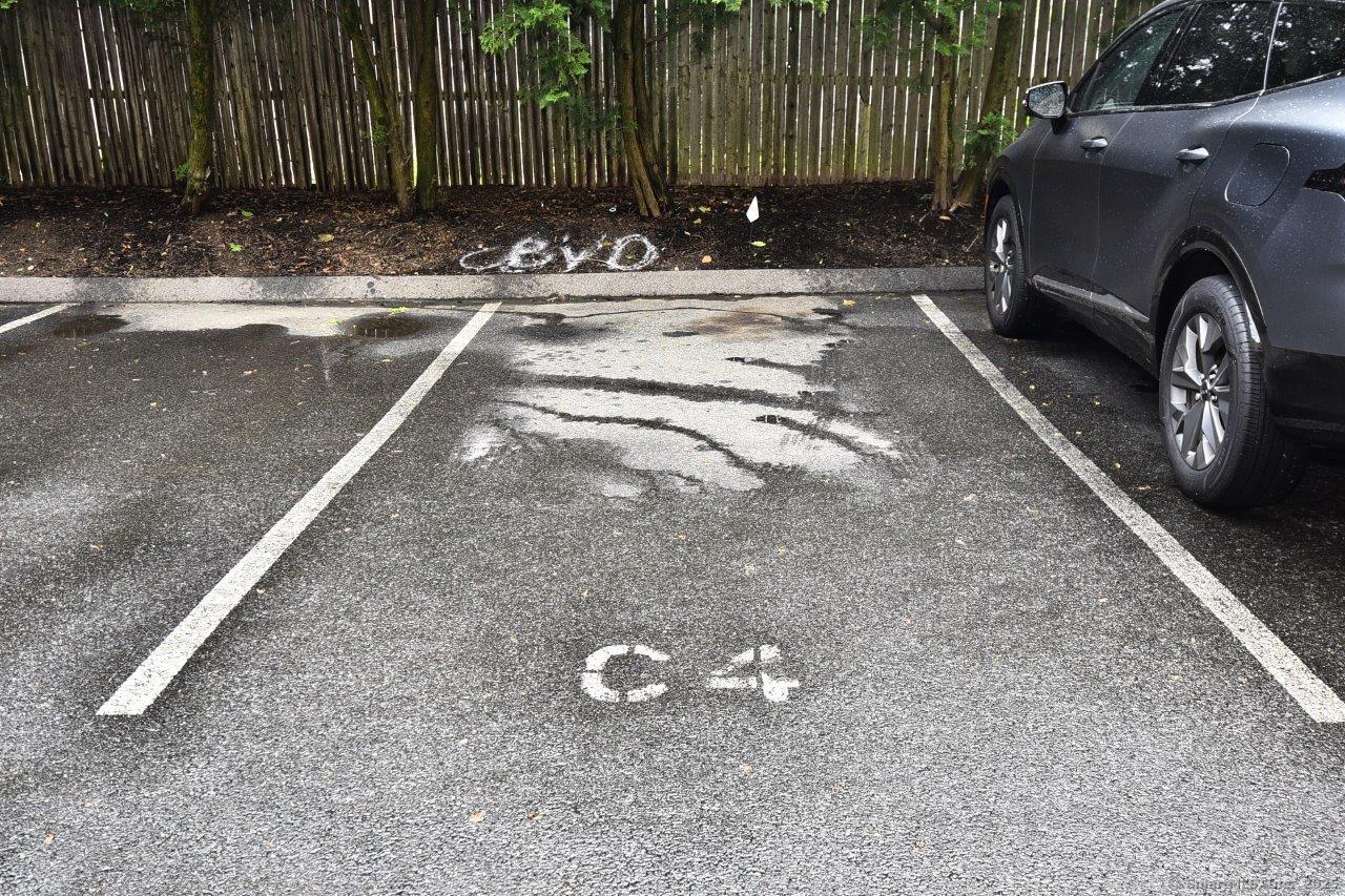 178 Flax Hill Road, Unit C203 Norwalk, CT 06854 - Photo 29 of 35 a view of car parked