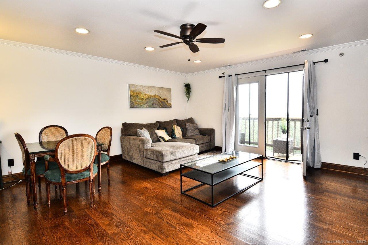 178 Flax Hill Road, Unit C203 Norwalk, CT 06854 - Photo 5 of 35 a living room with furniture and a window