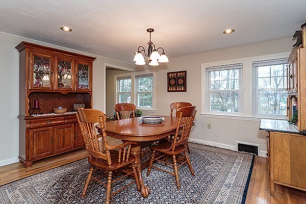 18 Proctor Road Chelmsford, MA 01824 - Photo 10 of 30 a view of a dining room with furniture window and wooden floor