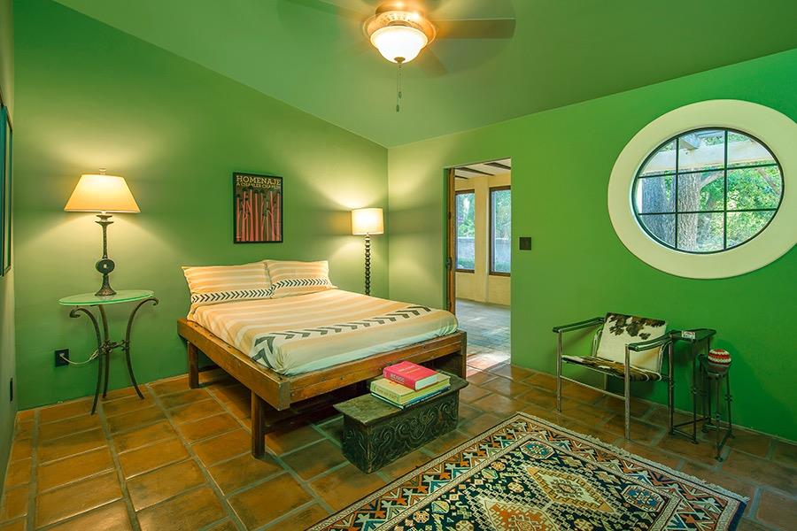 1369 Foothill Road Ojai, CA 93023 - Photo 15 of 30 a bedroom with a bed and a mirror