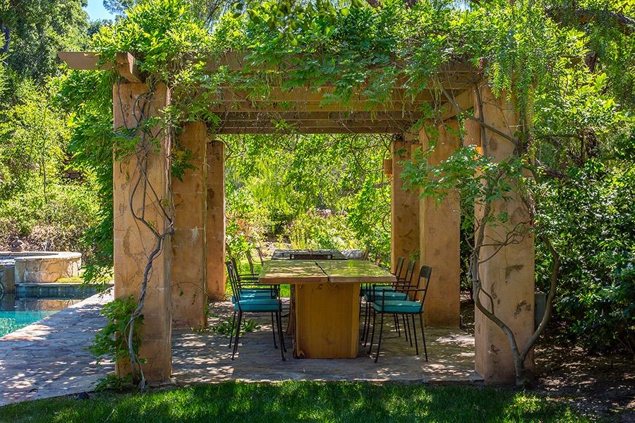 1369 Foothill Road Ojai, CA 93023 - Photo 19 of 30 a view of backyard with plants and outdoor seating