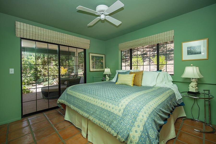 1369 Foothill Road Ojai, CA 93023 - Photo 24 of 30 a bedroom with a bed and a window
