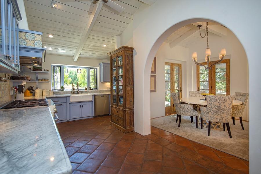 1369 Foothill Road Ojai, CA 93023 - Photo 9 of 30 a view of a kitchen with dining area a chandelier and wooden floor