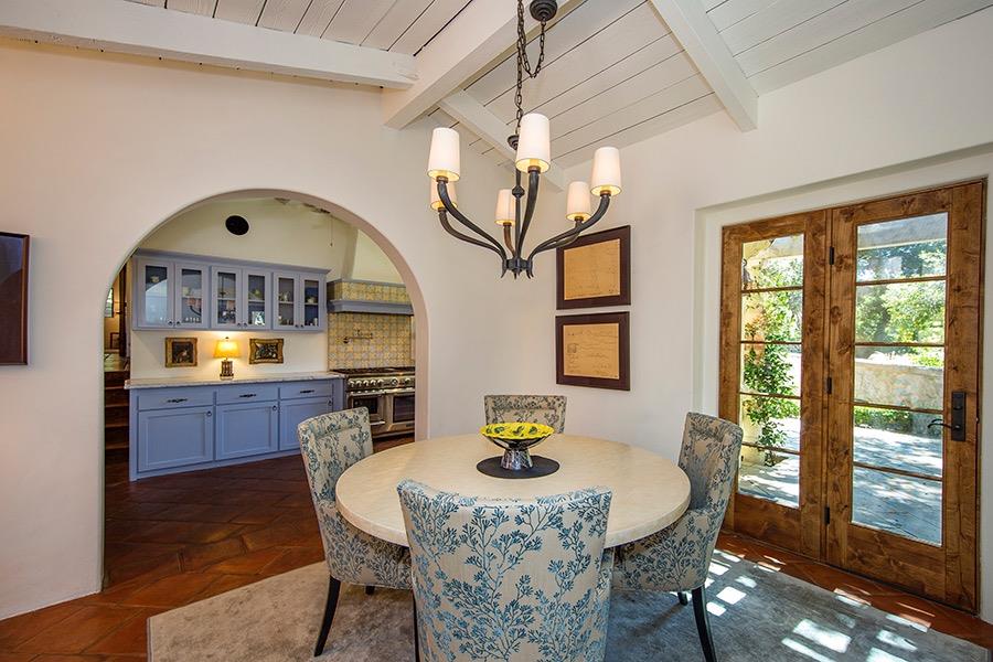 1369 Foothill Road Ojai, CA 93023 - Photo 10 of 30 a dining room with furniture a window and a chandelier