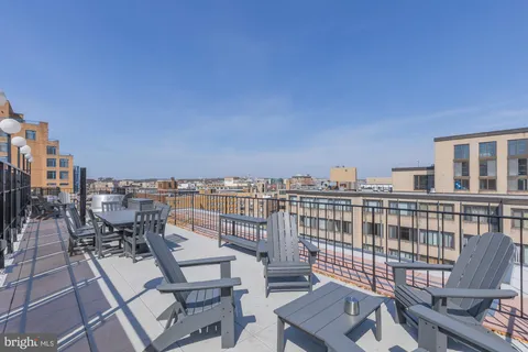 a view of a terrace with chairs